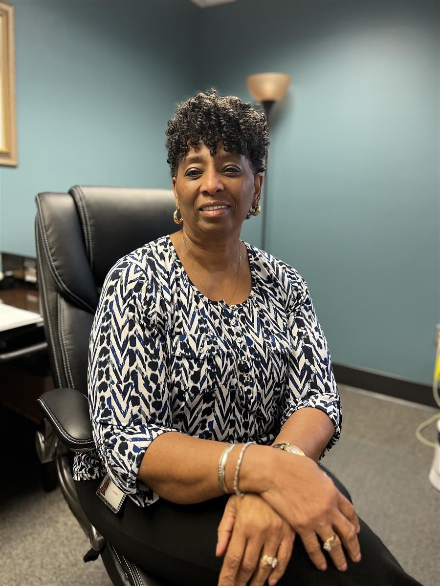 Benita Bibb smiles to camera.